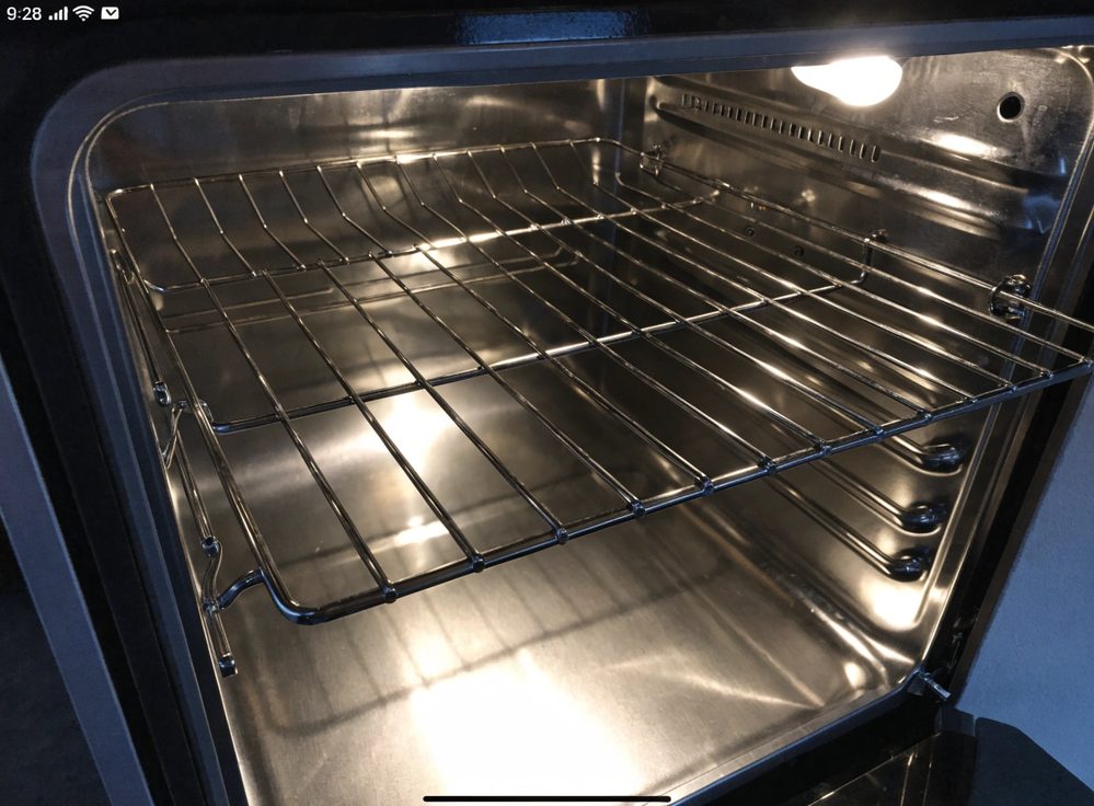 Oven interior, baked-on carbon and spills removed — after