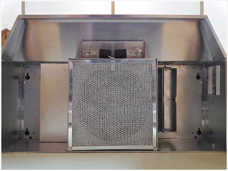 Range hood interior and filter, baked-on grease removed — after
