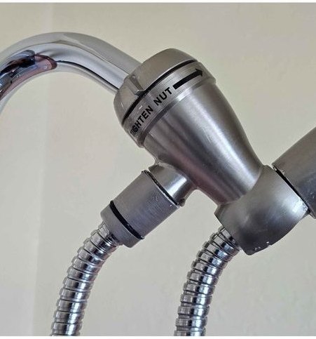 Shower valve and fittings descaled and polished — after
