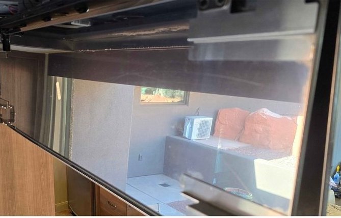 Stove exhaust cover, heavy grease and dust removed — after